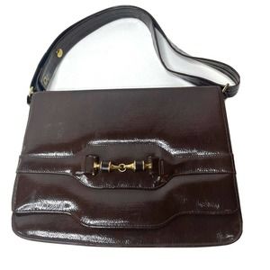 An Air Step Handbag Metal Bit Messenger Crossbody